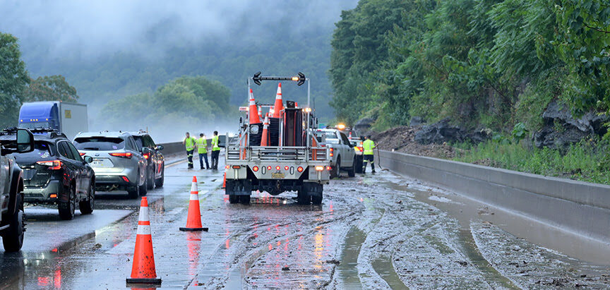 Division of Highways and Turnpike clean up flood debris in Clay County, West Virginia, August 2023.