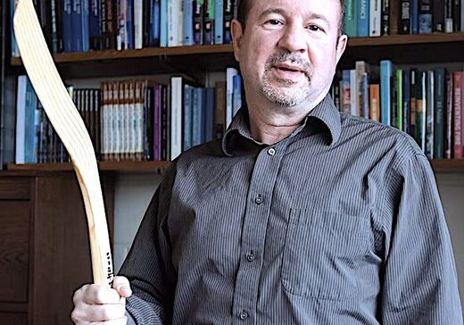 man and stick