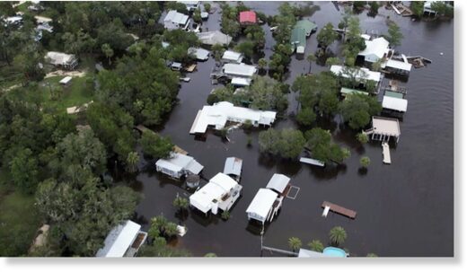 Click to enlarge This aerial photo shows homes surrounded by floodwaters in Steinhatchee, Fla., Wednesday, Aug. 30, 2023, left behind by Hurricane Idalia.