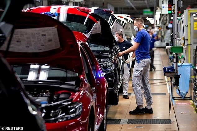 worker at a Volkswagen assembly line in Wolfsburg