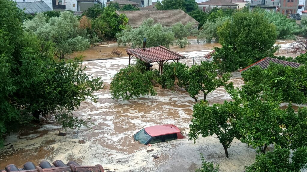 Click to enlarge Floodwaters cover a car and the yards of houses in Milina village, Pilion region, central Greece, Tuesday, September 5, 2023.