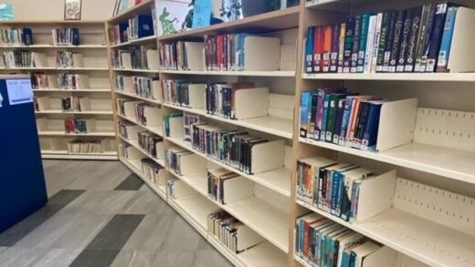Click to enlarge Mississauga high school library, bookshelves, Peel District School Board