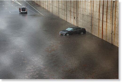 A vehicle stuck in high water on the Prospect Expressway in Brooklyn on Friday.