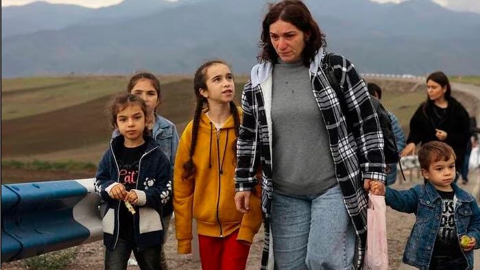 Click to enlarge family flee