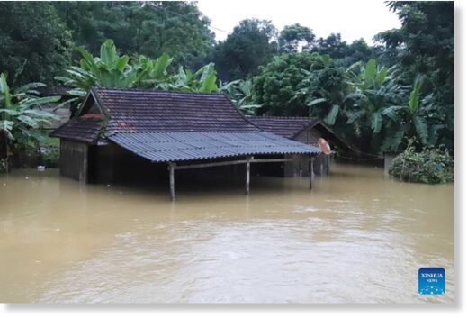 Click to enlarge This photo taken on Sept. 27, 2023 shows a house in flood water in Vietnam's central Nghe An province