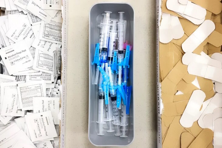 Click to enlarge swabs syringes bandaids vaccine supplies