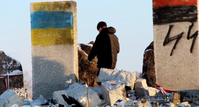 Click to enlarge Galicians vandalized the memorials to the villagers of Huta Pieniacka with Ukrainian national and SS graffiti