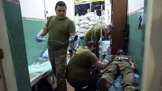 Click to enlarge ukraine battlefield medics wounded soldiers