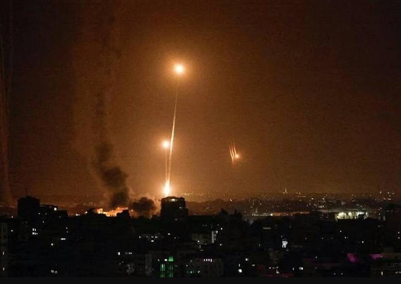 Rockets are fired from Gaza toward Israel, in Gaza, October 7, 2023.