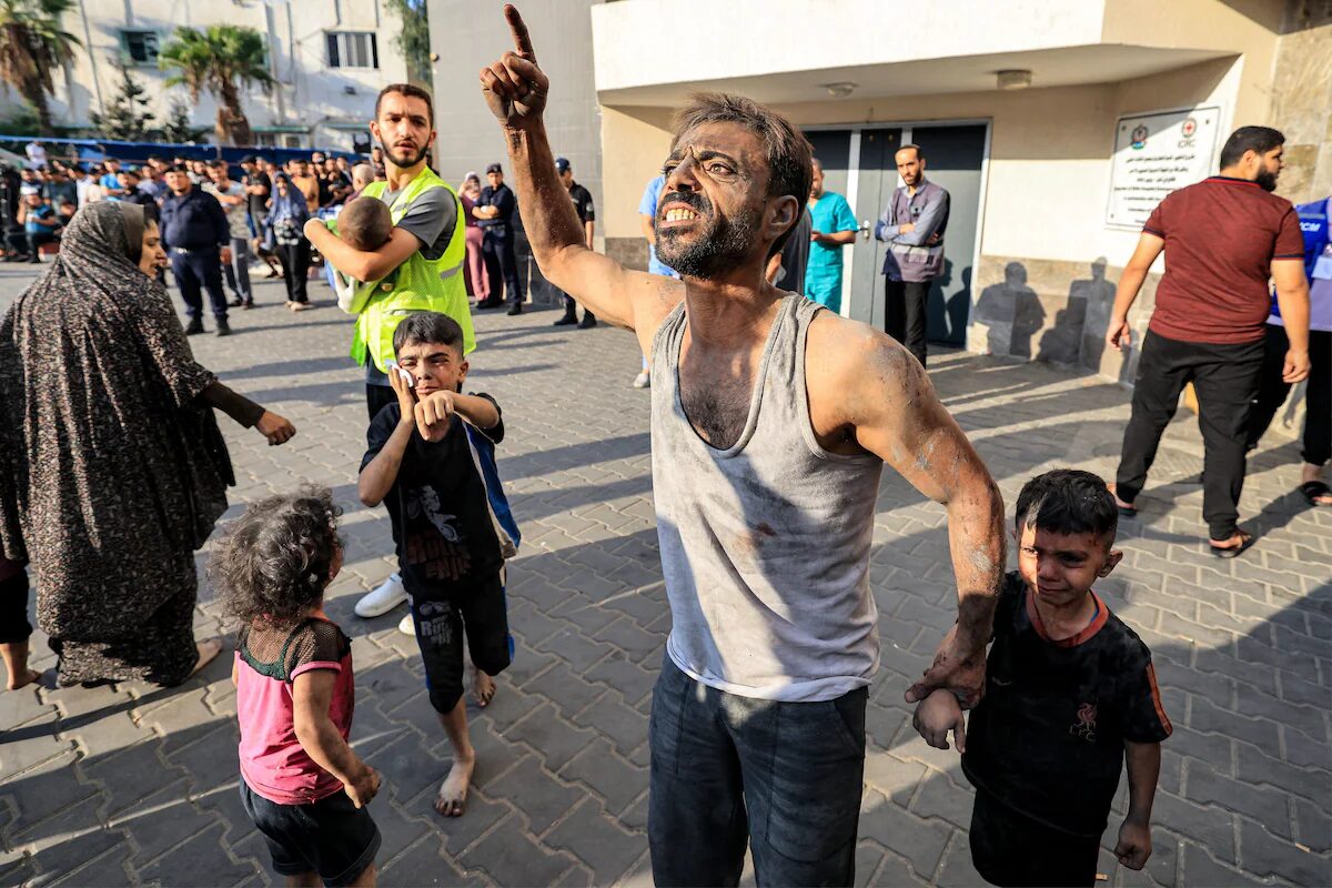 Click to enlarge Palestinian man and child