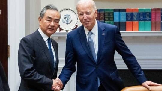 Click to enlarge wang yi biden