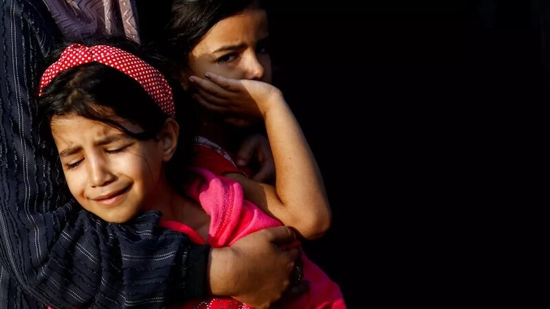 Young girls mourn the Palestinians killed
