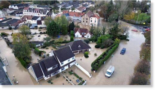 Click to enlarge An aerial view shows a flooded area as the La Liane River overflows in Pont-de-Briques, near Boulogne-sur-Mer, after heavy rain caused flooding in northern France on November 7, 2023