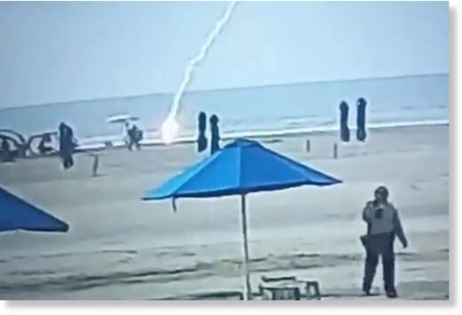 CCTV security video footage of the moment shows bikini-clad Froilanis suddenly hit by lightning