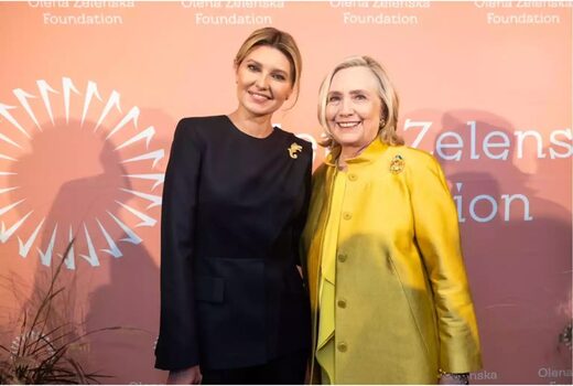 Olena and Hillary embrace