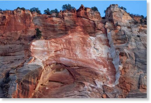 Close up view of the cliff face where the rock wall dislodged.