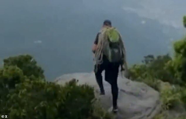Leilson de Souza was standing over a rock when he was struck by lightning at Tijuca National Park in Rio de Janeiro. He was declared dead on the scene