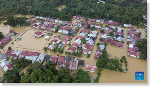 This aerial photo taken on Nov. 22, 2023 shows houses submerged by flood after heavy rain in Aceh Barat district, Aceh Province, Indonesia.
