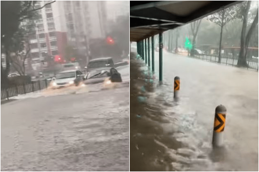 Click to enlarge The water level in Boon Lay Avenue almost reached the height of the seats of a bus stop, with vehicles travelling slowly along that road.