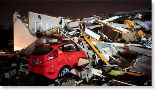 A car was seen buried under the ruins of a home in Hendersonville