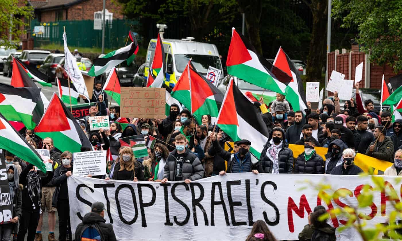 Protesters outside a facility used by the Israeli