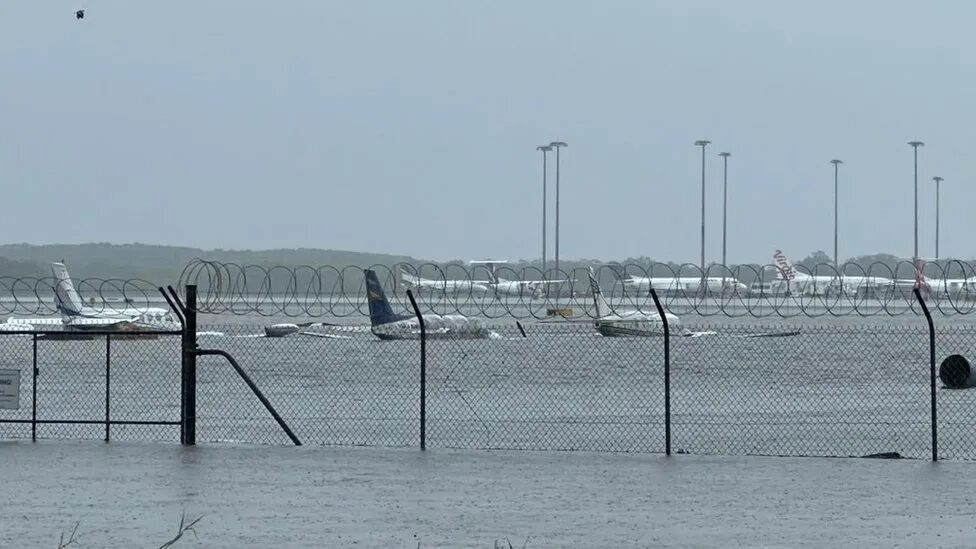 Floods have inundated many places in far north Queensland, including Cairns Airport
