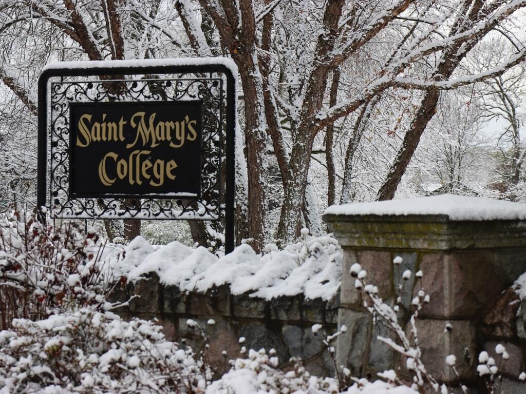 A sign for St. Mary's College is pictured. 3 Students and Catholic