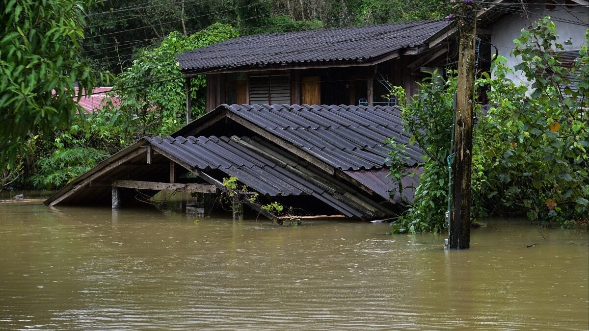 Southern Thailand hit by severe floods, people take refuge on rooftops