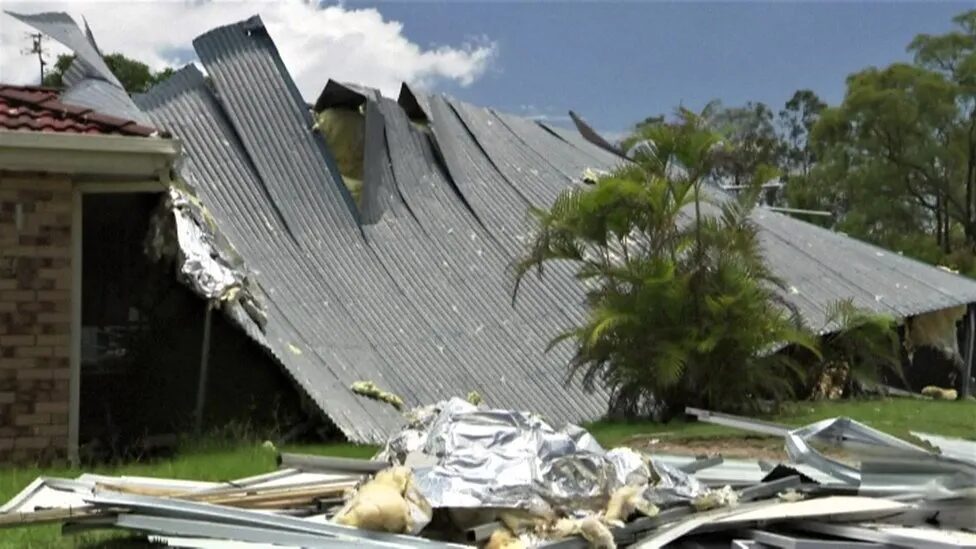 Roofs were torn off homes and electricity poles ripped from the ground in Queensland