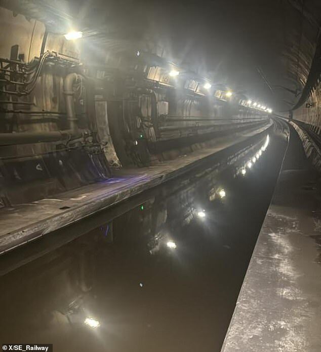 Click to enlarge train tunnel flooded london