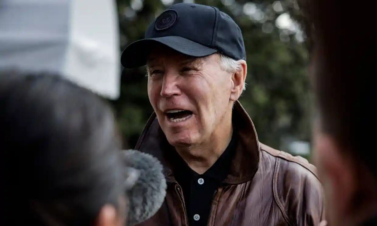 Click to enlarge US president Joe Biden speaks to the press before flying to Camp David, on the south lawn of the White House on 13 January 2024 in Washington DC.