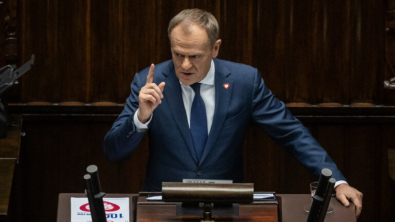 Click to enlarge Polish Prime Minister Donald Tusk speaking at the parliament in Warsaw