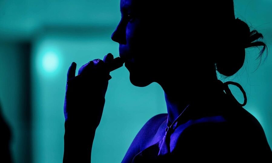 Click to enlarge woman vaping