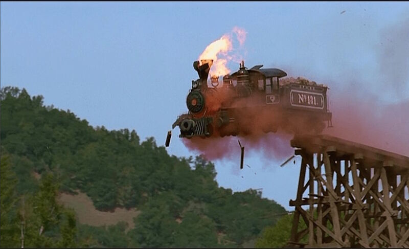 train wreck bridge flames