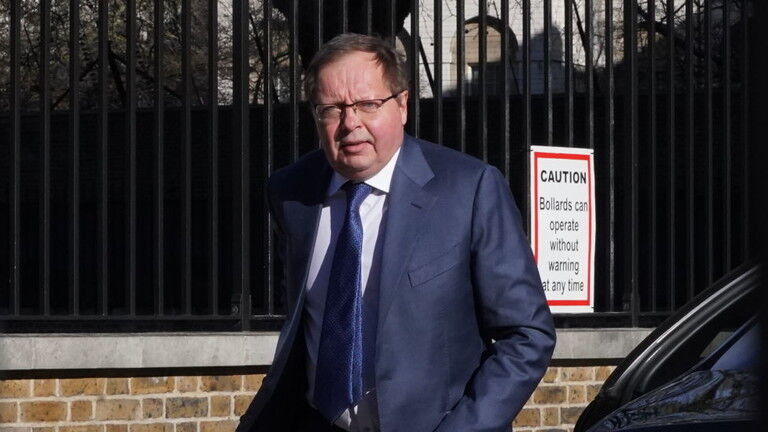 Russian Ambassador to the UK Andrey Kelin walks in central London in February 2022