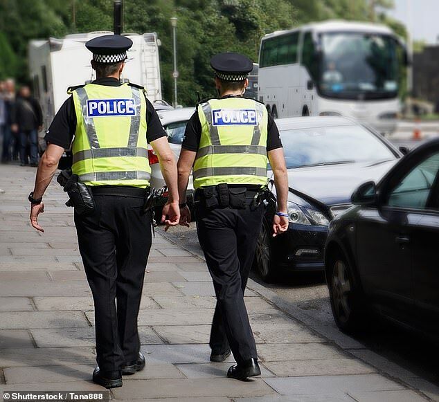 Britain police officers foot patrol