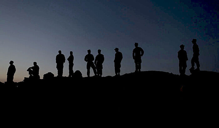men on ridge