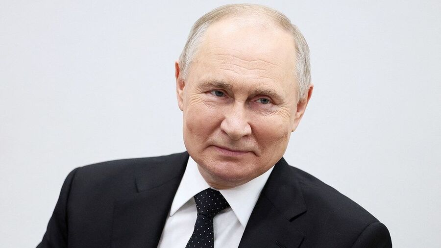 Putin smiling