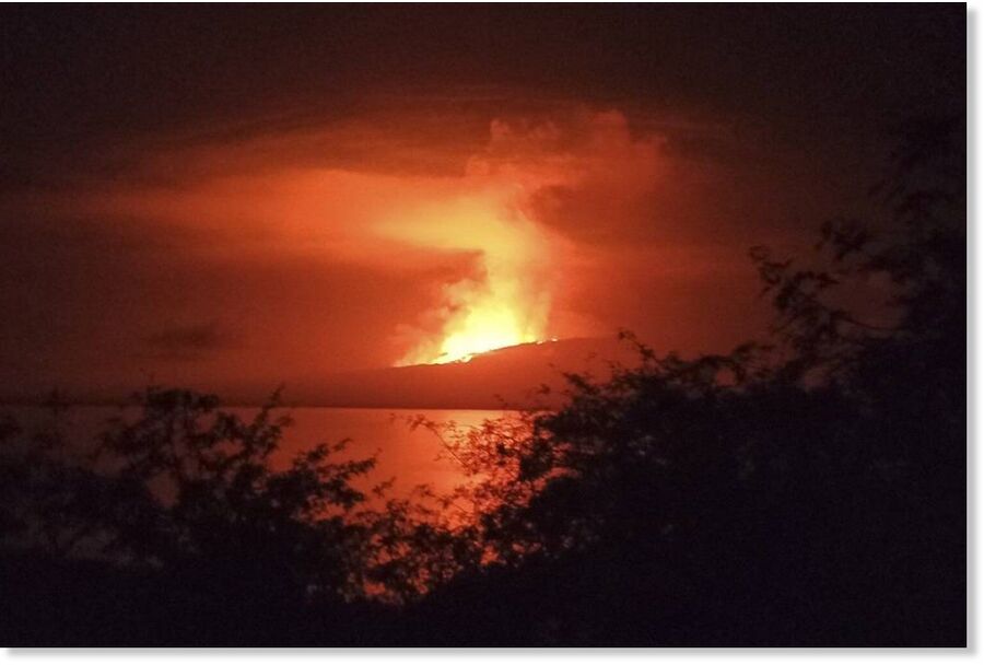 In this photo released by Galapagos National, La Cumbre volcano erupts a the Fernandina Island, in Galápagos Islands, Ecuador. Sunday, March 3, 2024.