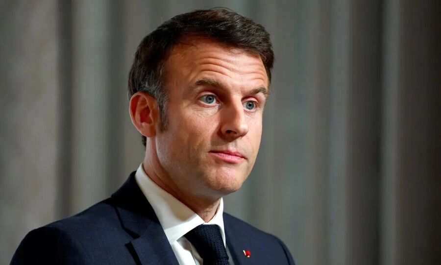 French President Emmanuel Macron looks on during a press conference at the end of the international conference aimed at strengthening Western support for Ukraine, in Paris, on Feb. 26, 2024.