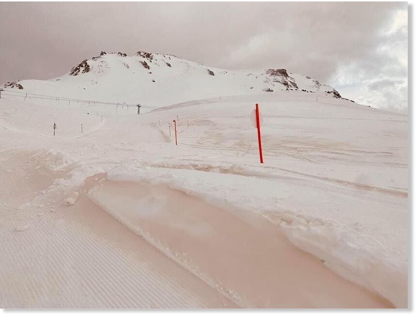 Red sand on the slopes in Scuol in the Engadin valley in Switzerland.