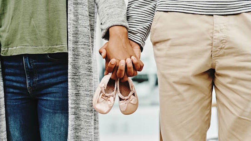 Click to enlarge parents baby shoes mother father