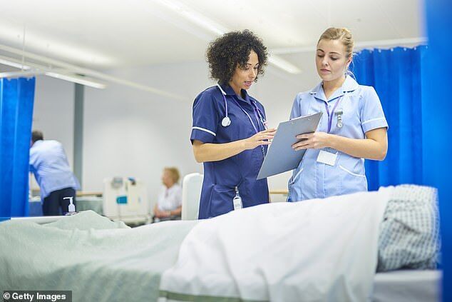 Click to enlarge NHS nurses protst trangender worker