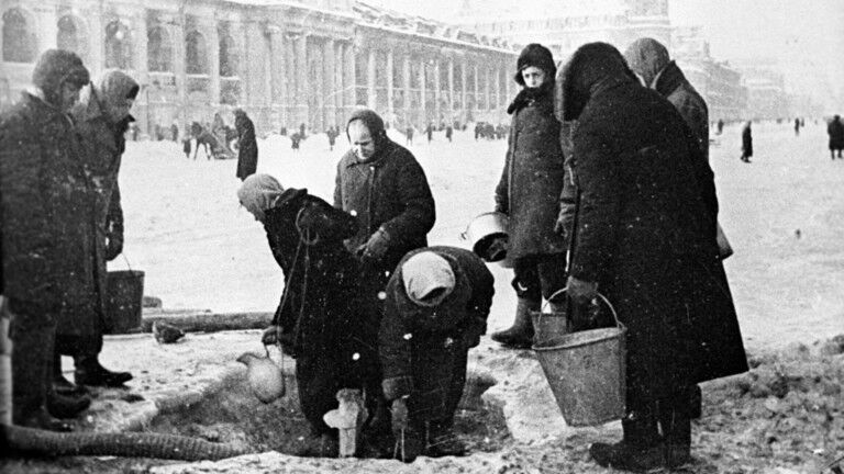 Click to enlarge FILE PHOTO. People collect water during Nazi Germany's blockade of Leningrad in December 1941