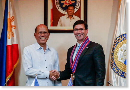 Click to enlarge Defense Mark Esper shakes hands with his Philippine counterpart Delfin Lorenzana