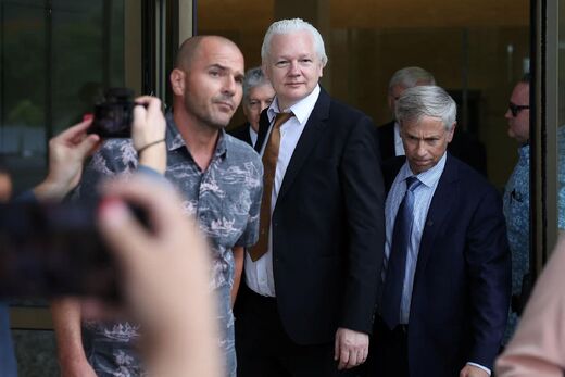 Click to enlarge assange saipan court