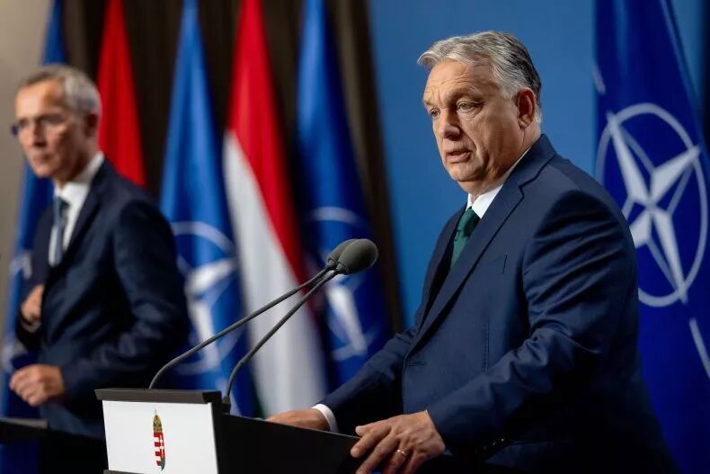 Click to enlarge Hungarian Prime Minister Viktor Orban (R) and NATO Secretary General Jens Soltenberg