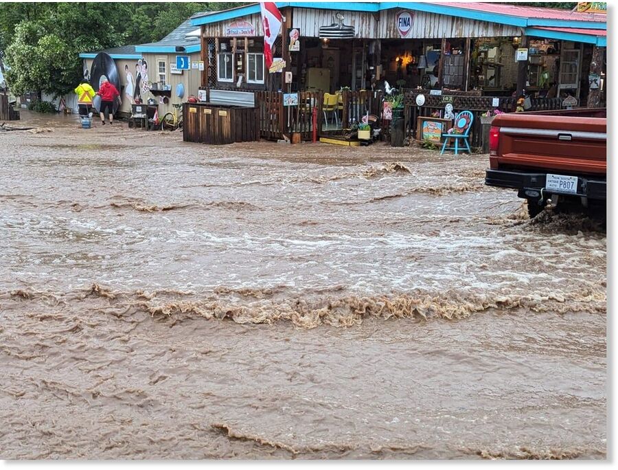 Flooding outside Frank and Dora's Takeout in Cornwallis, N.S., on July 11, 2024.