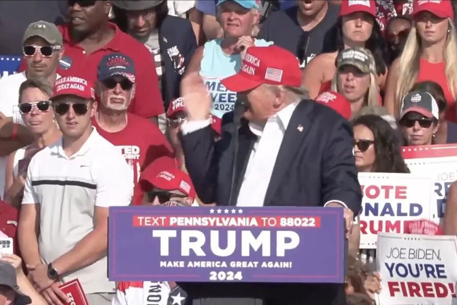 Click to enlarge Former President Trump on stage