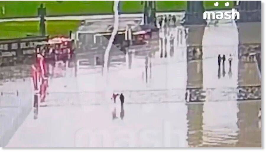 Two men and a woman were seen falling to the ground